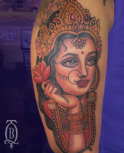 Explore lucky tattoo ideas, creative tattoo ideas in Marietta, available at The Queen Bee Tattoo and Piercing Parlour