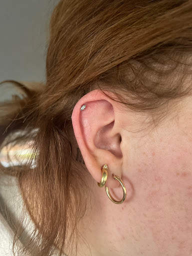 Explore gladiolus tattoo ideas, creative tattoo ideas in Orem, available at Pierced the Studio