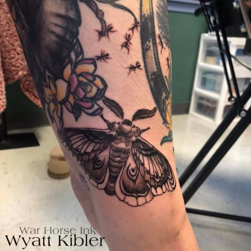 Explore foot tattoo ideas for females, creative tattoo ideas in Kent, available at War Horse Ink