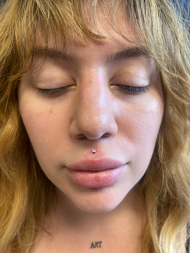 Explore stomach tattoo ideas for females, creative tattoo ideas in Augusta, available at Mr. Tattoo