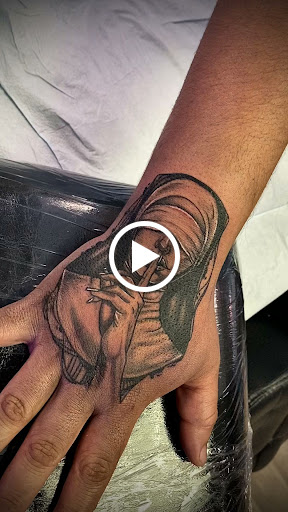 Explore cupid tattoo ideas, creative tattoo ideas in Modesto, available at Dying Art Tattoo