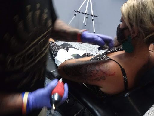 Explore stomach tattoo ideas for guys, creative tattoo ideas in Monroe, available at Skin City Tattoo Studio
