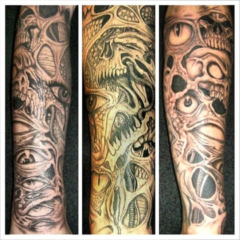 Explore cross sleeve tattoo ideas, creative tattoo ideas in Independence, available at Odins Mark Tattoo and Emporium