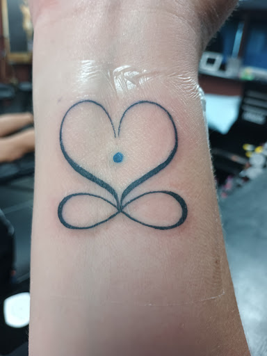 Explore graduation tattoo ideas, creative tattoo ideas in Saint Petersburg, available at Foolish Pride Tattoo Co.