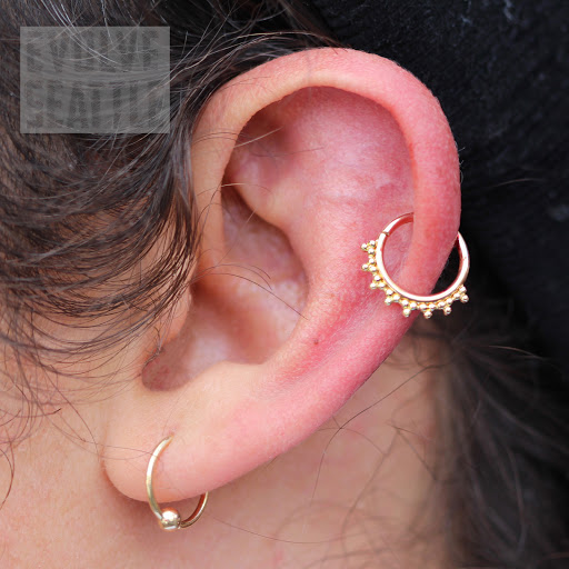 Find paradox tattoo ideas for your next unique tattoo in Seattle at Evolve Seattle