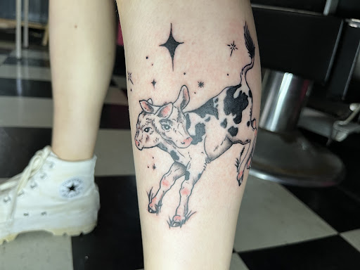 Explore beach tattoo ideas for men, creative tattoo ideas in Medina, available at Art In Motion Inc Tattooing