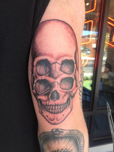 Explore cross sleeve tattoo ideas, creative tattoo ideas in Reno, available at Aces Tattoo