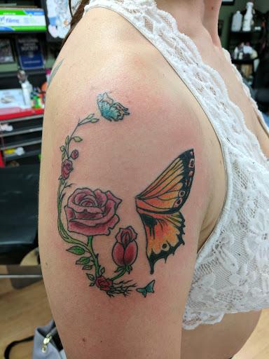 Explore leg tattoo ideas for females, creative tattoo ideas in Coeur D Alene, available at Jojos Tattoo & Body Piercing
