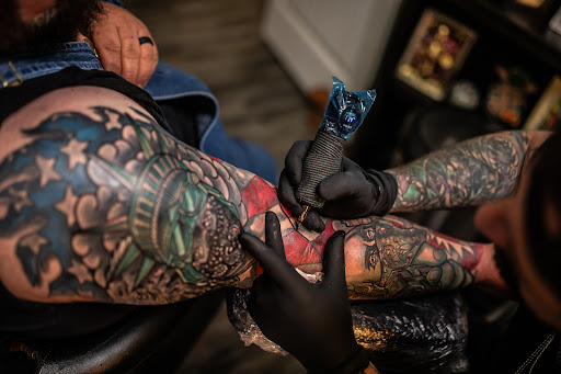 Explore tattoo flower sleeve ideas, creative tattoo ideas in Leesville, available at Revolution Ink Tattoo and Art Gallery
