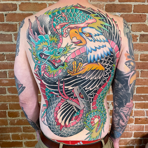 Explore full leg sleeve tattoo ideas, creative tattoo ideas in Buffalo, available at The Tilted Rose Tattoo