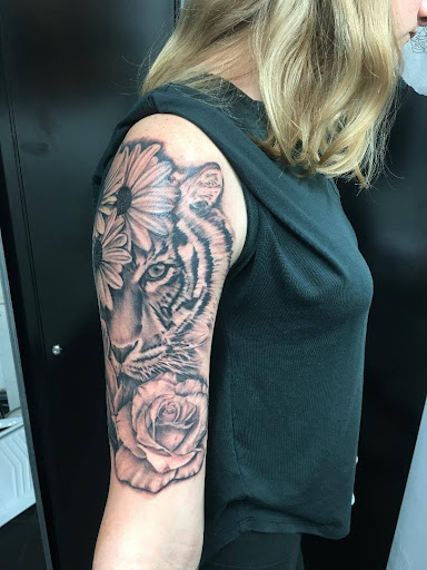 Explore initial tattoo ideas for guys, creative tattoo ideas in Washington, available at Fattys Tattoos & Piercings Dupont Circle