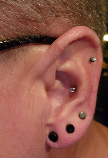 Explore loyalty over love tattoo ideas, creative tattoo ideas in Rock Island, available at Quad City Pierce Pro Nick
