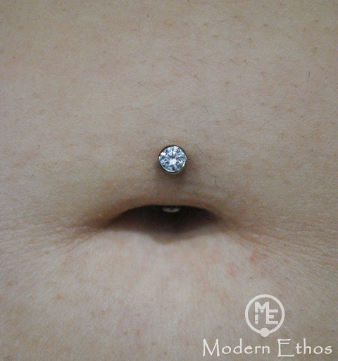 Find skull ideas sleeve tattoos for your next unique tattoo in New Cumberland at Modern Ethos Piercing