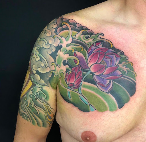 Explore tattoo sleeve ideas lion, creative tattoo ideas in Tampa, available at HAWKS ELECTRIC TATTOOS