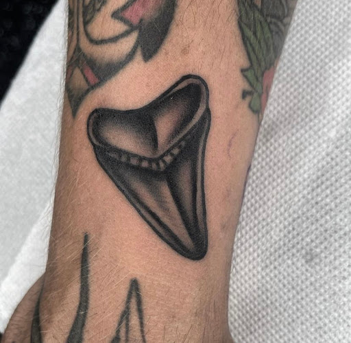 Explore shading ideas for sleeve tattoos, creative tattoo ideas in North Fort Myers, available at Loyal 2 The Coil Tattoos & Body Piercings