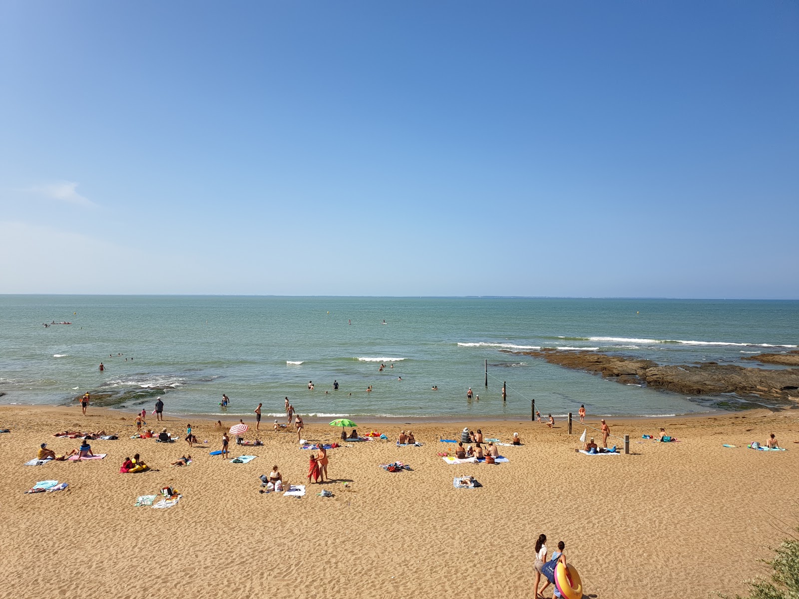 Foto van Joseliere beach met beige zand en stenen oppervlakte