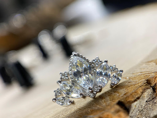 Explore rose tattoo cover up ideas, creative tattoo ideas in Dover, available at Agap Body Piercings