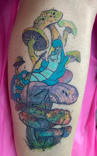 Explore lilo and stitch tattoo ideas, creative tattoo ideas in Benton, available at Spectrum Tattoo