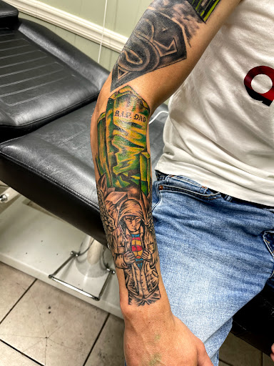 Explore blackout hand tattoo ideas, creative tattoo ideas in Gadsden, available at Zekez Inkz Tattoos & Piercings