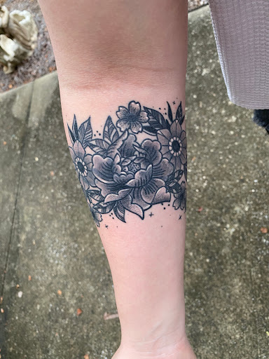 Explore loyalty over love tattoo ideas, creative tattoo ideas in Hanceville, available at Dodge City Tattoo Company