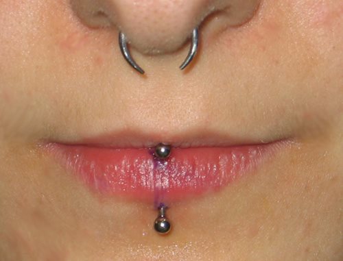 Explore shield tattoo ideas, creative tattoo ideas in Somerville, available at Piercings by Tiffany at Artisanal Tattoo