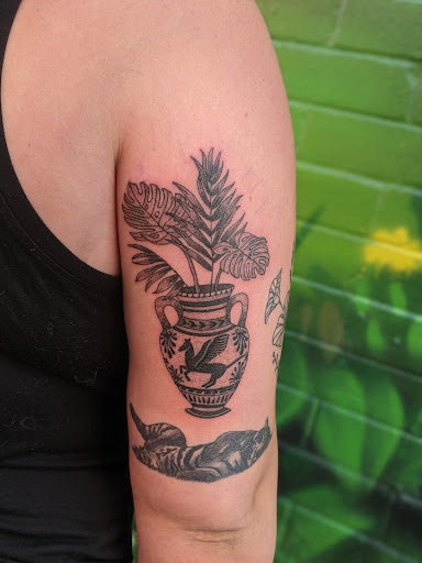 Explore miami dolphins tattoo ideas, creative tattoo ideas in Denver, available at Certified Tattoo Studios