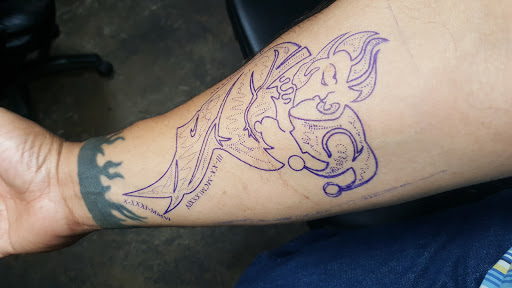 Explore packer tattoo ideas, creative tattoo ideas in Odessa, available at Heart And Dagger Tattoo