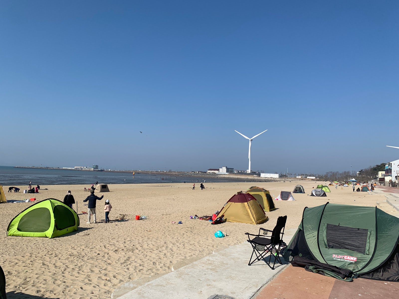 Foto av Daebuduk Beach med hög nivå av renlighet