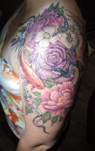 Explore charizard tattoo ideas, creative tattoo ideas in Coquille, available at Inspired Ink Tattoo Shop
