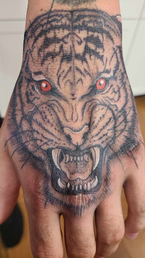 Explore tattoos ideas for men cross, creative tattoo ideas in Norway, available at Norway Lakes White Raven Tattoo