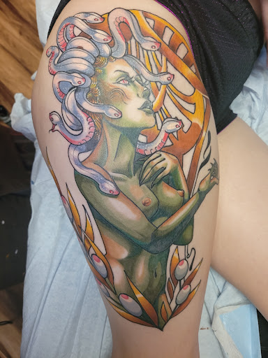 Explore animal tattoo sleeve ideas, creative tattoo ideas in Anniston, available at Lucid Dreams Tattoos and Piercings