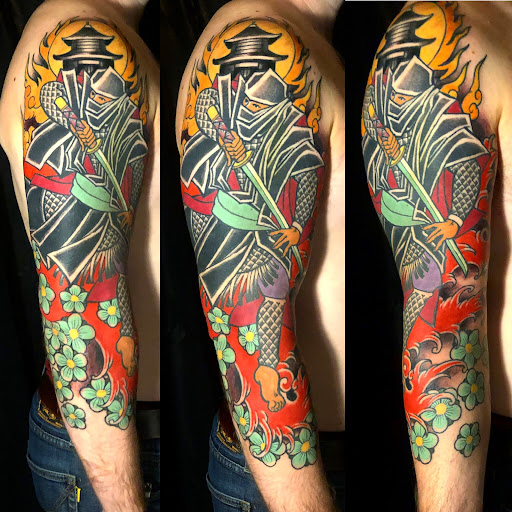 Explore wolf sleeve tattoo ideas, creative tattoo ideas in North Charleston, available at Blu Gorilla Tattoo