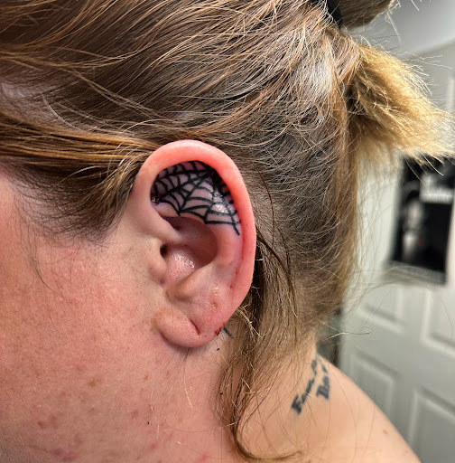 Explore flower foot tattoo ideas, creative tattoo ideas in Hudson Falls, available at ALTERED ADDICTION TATTOOS