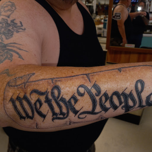 Explore colorful flower tattoo ideas, creative tattoo ideas in Roanoke Rapids, available at Greatful deadication tattoo and piercings