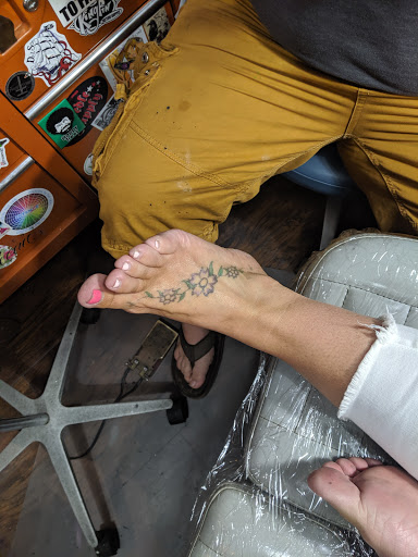 Explore sport tattoo ideas, creative tattoo ideas in Terre Haute, available at Black Tides Tattoos And Fine Art