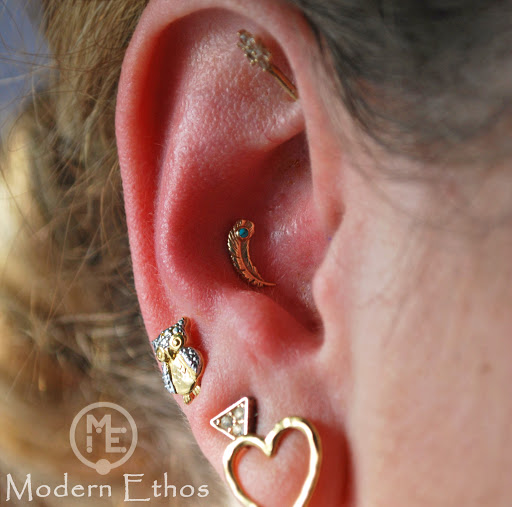 Explore back of arm tattoo ideas, creative tattoo ideas in New Cumberland, available at Modern Ethos Piercing