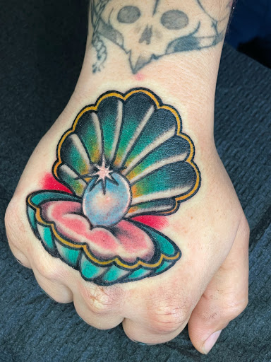 Find tattoo wedding band ideas for your next unique tattoo in Georgetown at Iron Rite Tattoo South