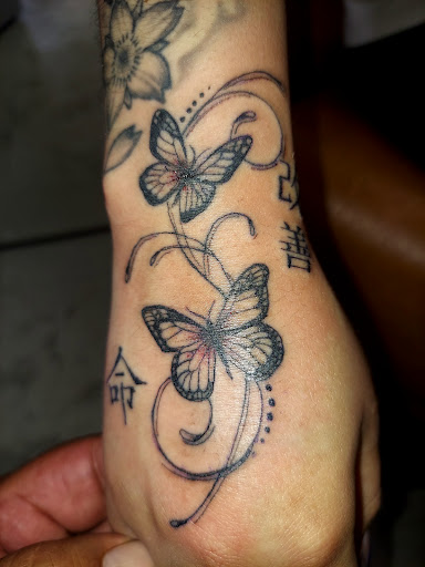Explore filipino flag tattoo ideas, creative tattoo ideas in Odessa, available at Little Dragon Tattoos Studio