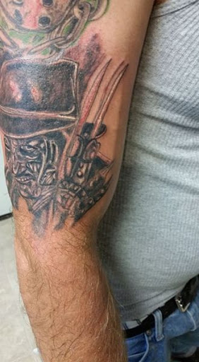 Explore party tattoo ideas, creative tattoo ideas in Cumberland, available at Queen City Ink