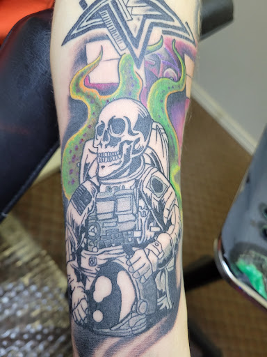 Explore black couple tattoo ideas, creative tattoo ideas in Angola, available at Hoodlum Ink