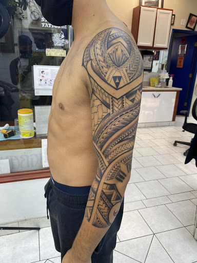 Explore microphone tattoo ideas, creative tattoo ideas in Sparks, available at Tidal Wave Tattoo