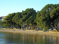 Foto von Praia do Bom Abrigo und die siedlung
