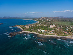 Foto de Playa Langosta con costa recta y larga