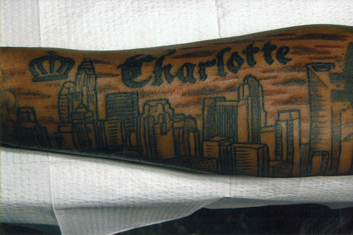 Explore godparent tattoo ideas, creative tattoo ideas in Charlotte, available at Crown Custom Tattoo Studios