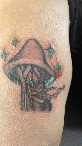 Explore thistle tattoo ideas, creative tattoo ideas in Hiawatha, available at CR Tattoo Company