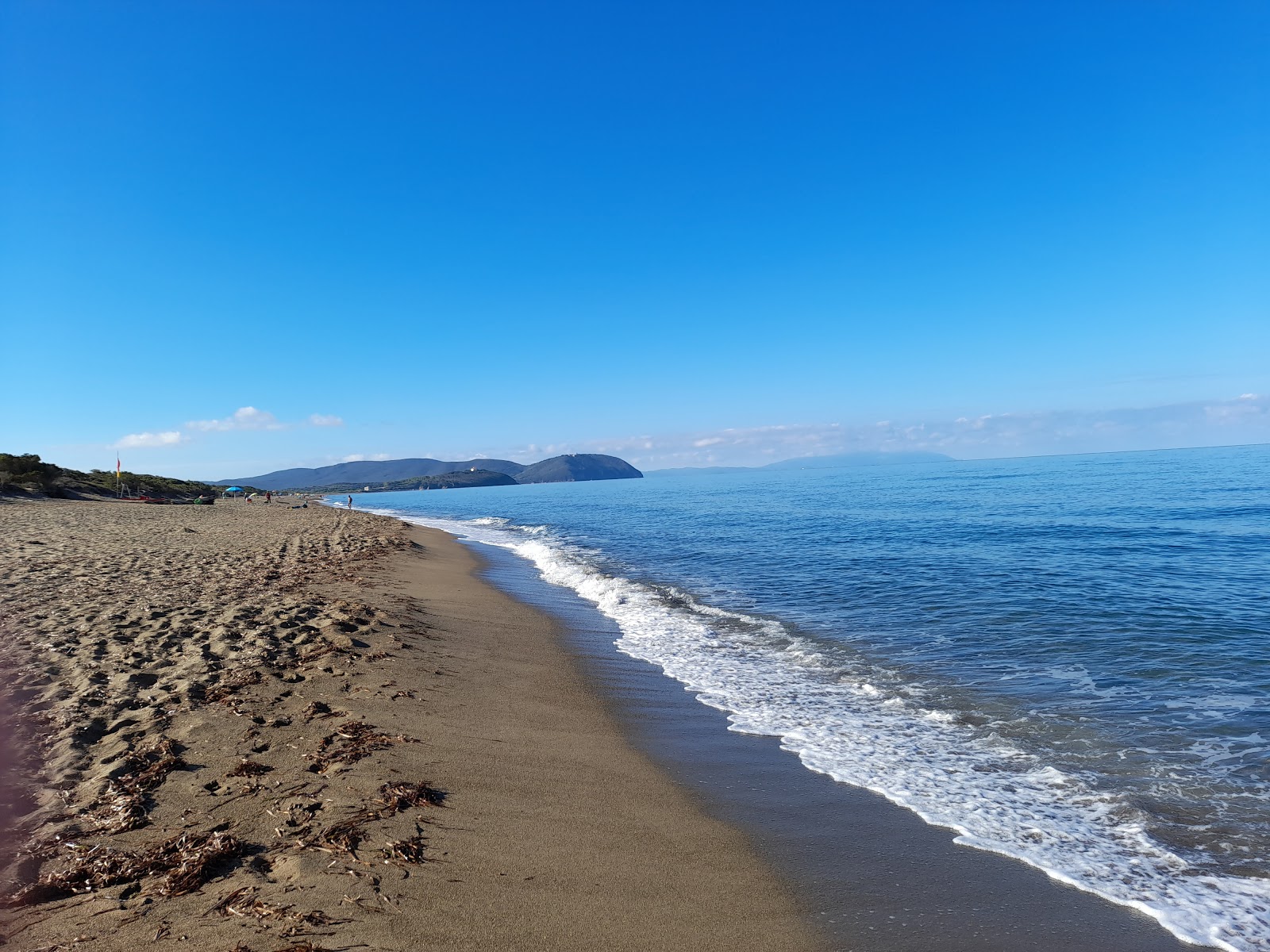 Zdjęcie Spiaggia di Rimigliano II z powierzchnią brązowy piasek