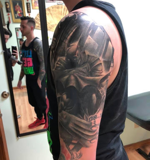 Explore matching tattoos for father and son ideas, creative tattoo ideas in Kenosha, available at Kenosha Tattoo Company