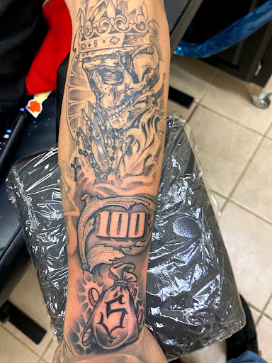 Find back tattoo ideas women for your next unique tattoo in Rogers at Ink Solutions Tattoo