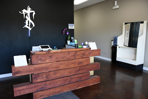 Explore black heart heart tattoo cover up ideas, creative tattoo ideas in Wisconsin Dells, available at Twisted Dimensions Tattoo Studio