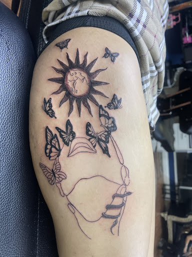 Explore filmmaker tattoo ideas, creative tattoo ideas in Cocoa, available at Rorschach Tattoo Shop and Piercing Studio